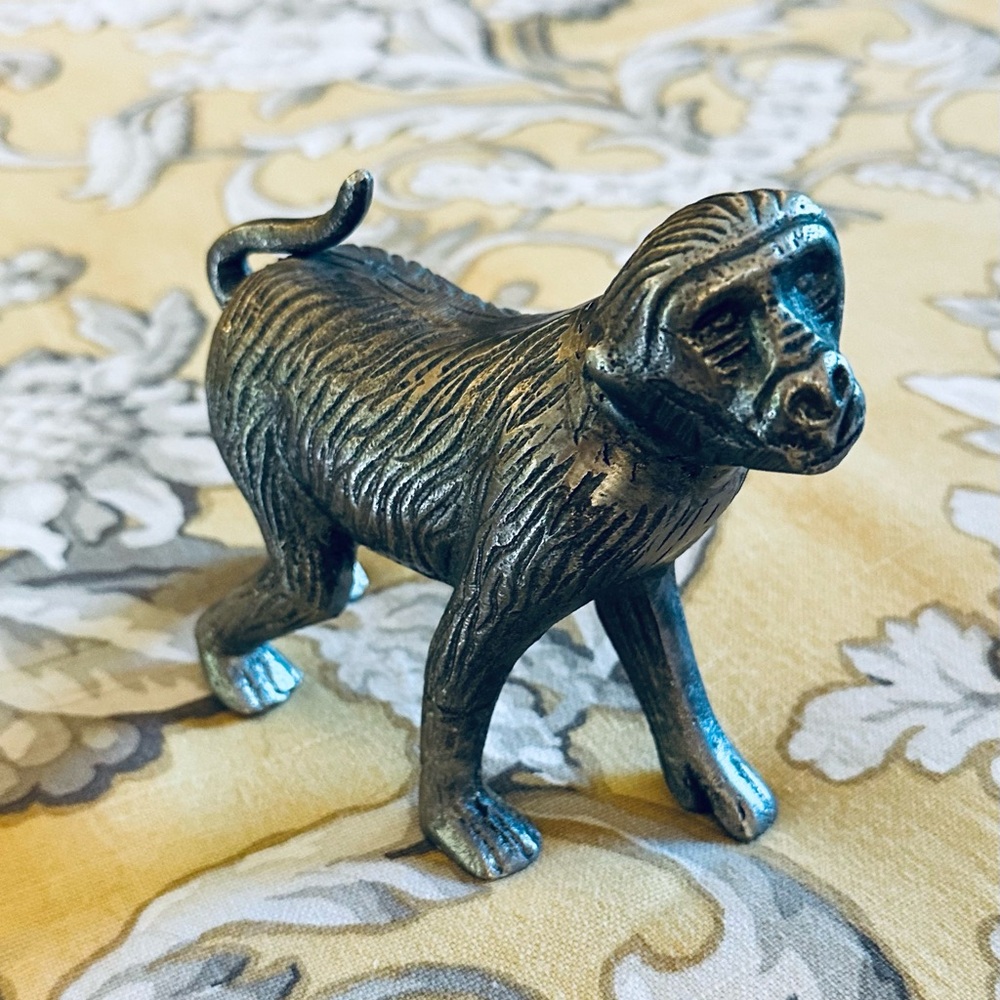 Fun vintage silver monkey.